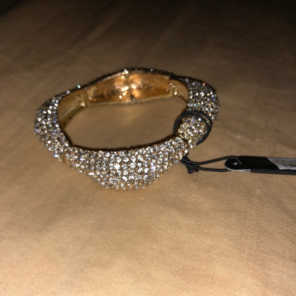 Diamond encrusted gold bracelet